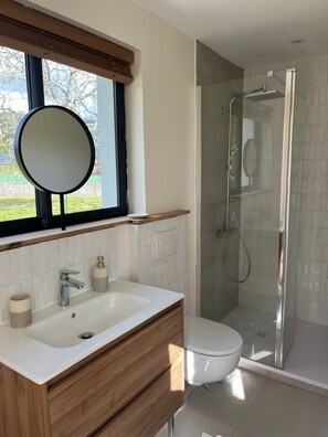 Shower, hair dryer, towels, soap