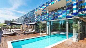 Indoor pool, outdoor pool, open 7:00 AM to 8:00 PM, pool umbrellas