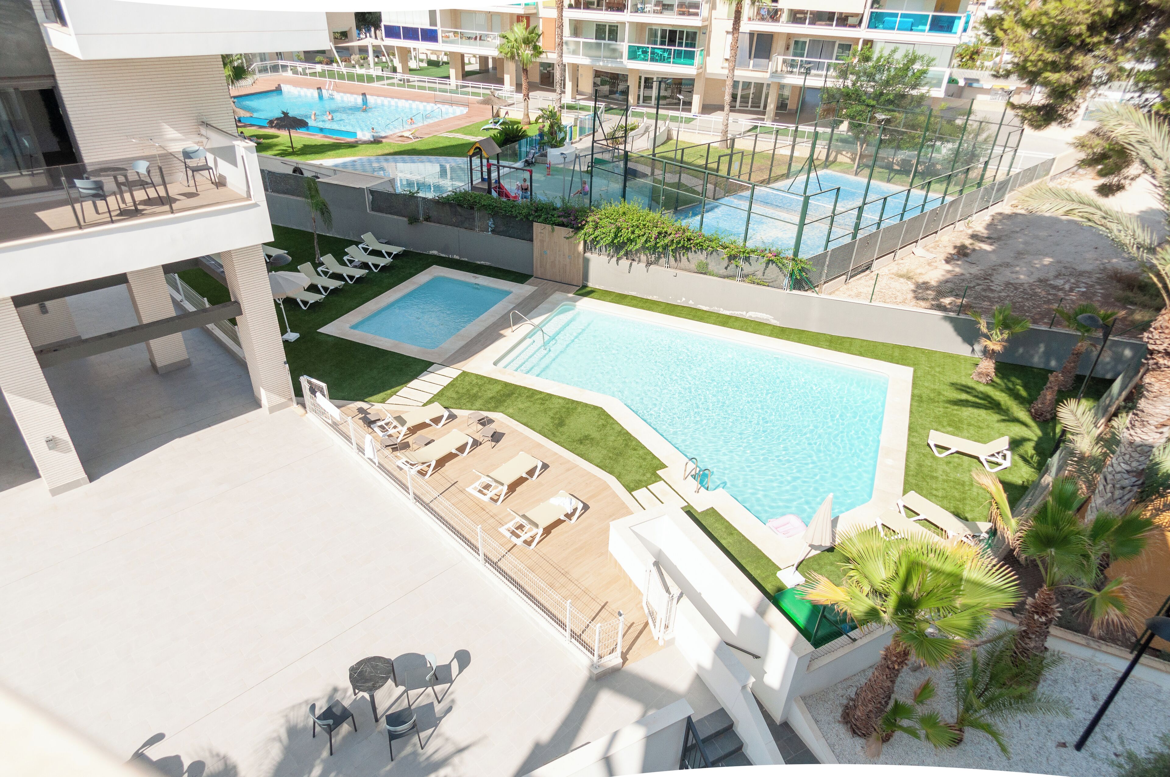 Outdoor pool, pool umbrellas, pool loungers