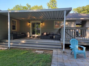 Terrace/patio - Rolling with the Tide? Stay in newly renovated 3/2 home, just 3mi from Stadium! (Northport)