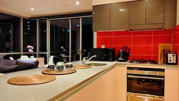 Luxury Apartment, Balcony, Ocean View | Private kitchen | Full-sized fridge, microwave, oven, stovetop