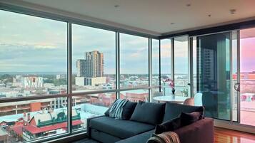 Luxury Apartment, Balcony, Ocean View | Living area | Flat-screen TV