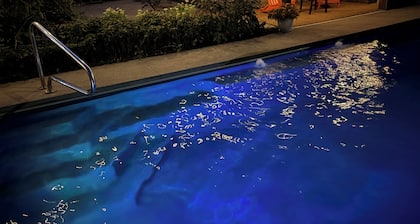 West Park retreat luxury salt water hot tub and heated fiberglass inground pool