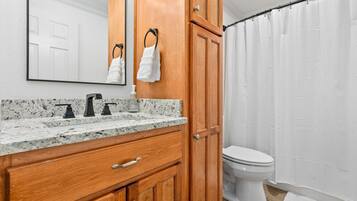 Hair dryer, towels, soap, shampoo