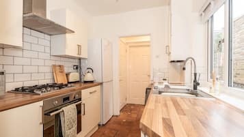 Fridge, microwave, toaster, cookware/dishes/utensils