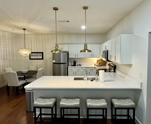 Newly Renovated Condo at The Bluffs West! Walk to campus, pool, and gym access. 