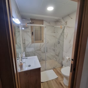 Shower, hair dryer, soap, shampoo