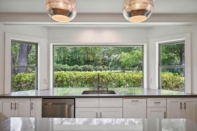"Whispering Oaks" Enjoy this 4-bedroom home with HUGE backyard