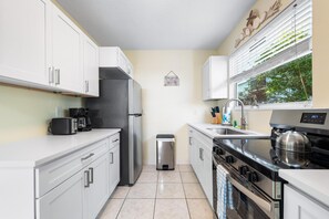 Apartment, 1 King Bed with Sofa bed (Pink Flamingo) | Private kitchen - Pink Flamingo (Siesta Key)