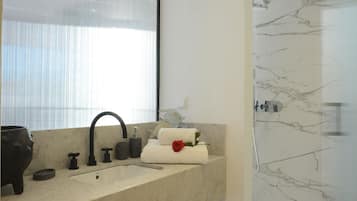 Deluxe Double Room | Bathroom | Hair dryer, slippers, towels, toilet paper