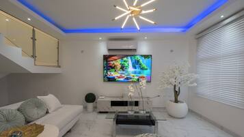 Habitación Deluxe doble, vistas al jardín | Zona de estar