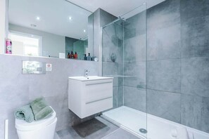 Shower, hair dryer, shampoo