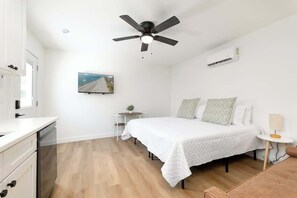 Iron/ironing board, travel crib, free WiFi, bed sheets