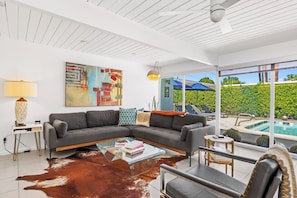 House, Multiple Beds, Pool Access, Pool View (Alexander Escape) | Living area | 50-inch flat-screen TV with digital channels, fireplace - Alexander Escape Private Pool! (Palm Springs)
