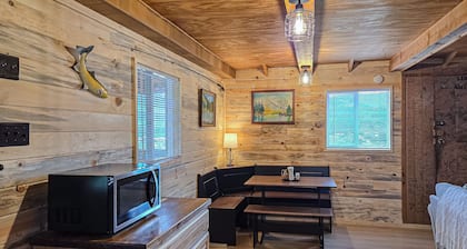 Charming cabin close to activities with spacious deck and great views