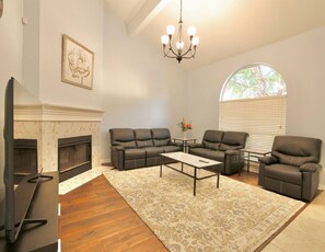 Smart TV, fireplace, foosball, books