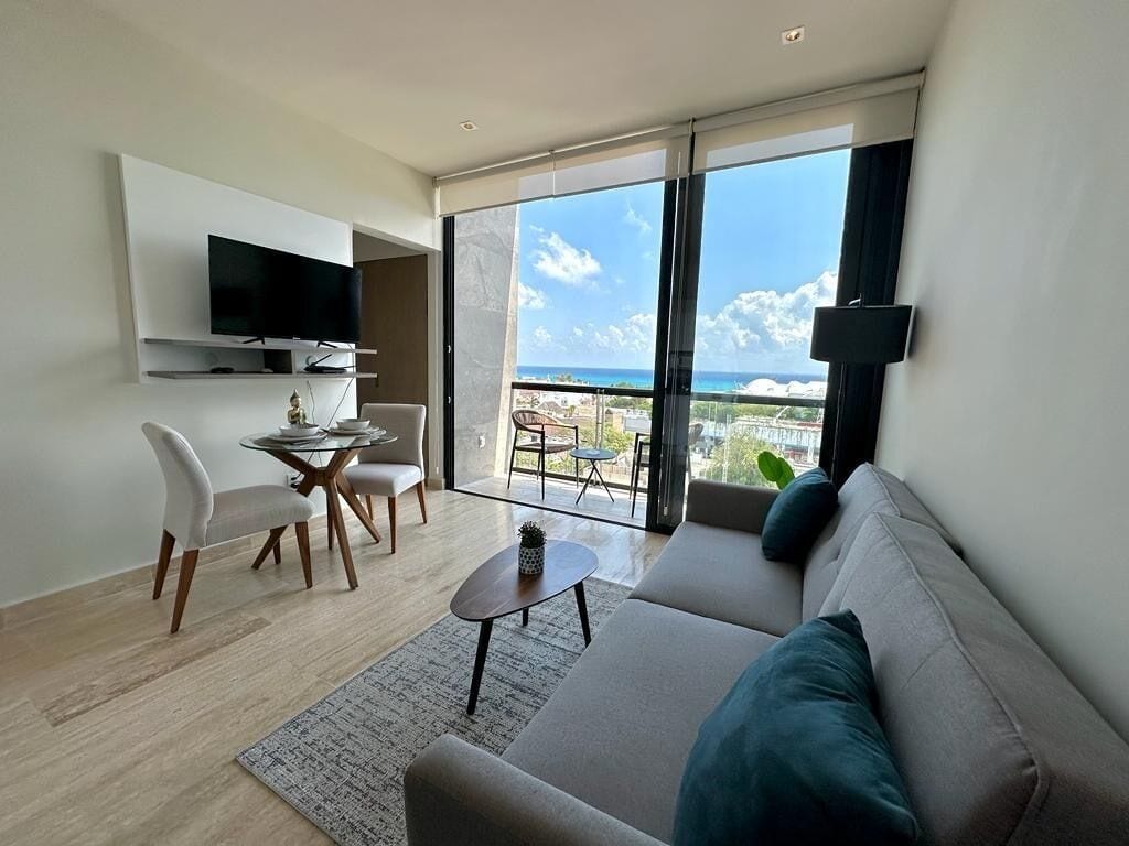 Departamento Deluxe | Área de sala de estar | Televisión LED 