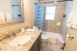 Hair dryer, towels, soap, shampoo