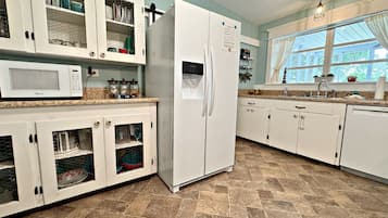 House, Multiple Beds, Patio, Garden View (Escape On The River) | Private kitchen | Coffee/tea maker