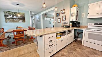 House, Multiple Beds, Patio, Garden View (Escape On The River) | Private kitchen | Coffee/tea maker