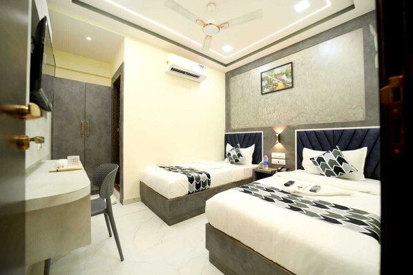 Deluxe Triple Room, City View | In-room safe, free WiFi, bed sheets - N.M. Hotel (Mumbai)