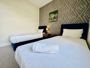 2 slaapkamers, een strijkplank/strijkijzer, gratis wifi, beddengoed