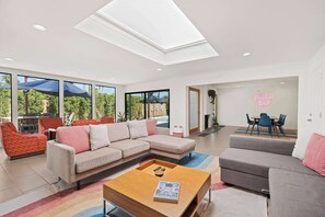 House, Multiple Beds, Pool Access, Pool View (Aurora Oasis) | Living area | 50-inch flat-screen TV with digital channels, fireplace - Aurora Oasis Stylish 4 BDR (Palm Springs)