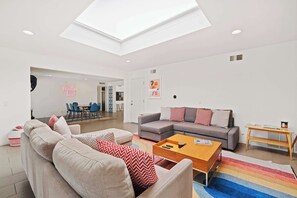 House, Multiple Beds, Pool Access, Pool View (Aurora Oasis) | Living area | 50-inch flat-screen TV with digital channels, fireplace - Aurora Oasis Stylish 4 BDR (Palm Springs)