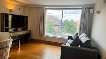 Superior Apartment | Living area | TV