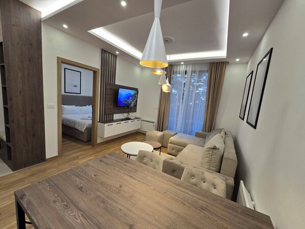 Comfort Apartment, Garden View | Living area