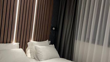 Comfort Apartment, Garden View | Desk, laptop workspace, blackout curtains, soundproofing
