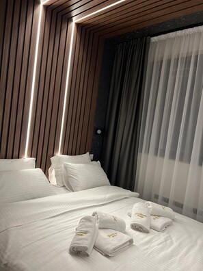 Comfort Apartment, Garden View | Desk, laptop workspace, blackout drapes, soundproofing