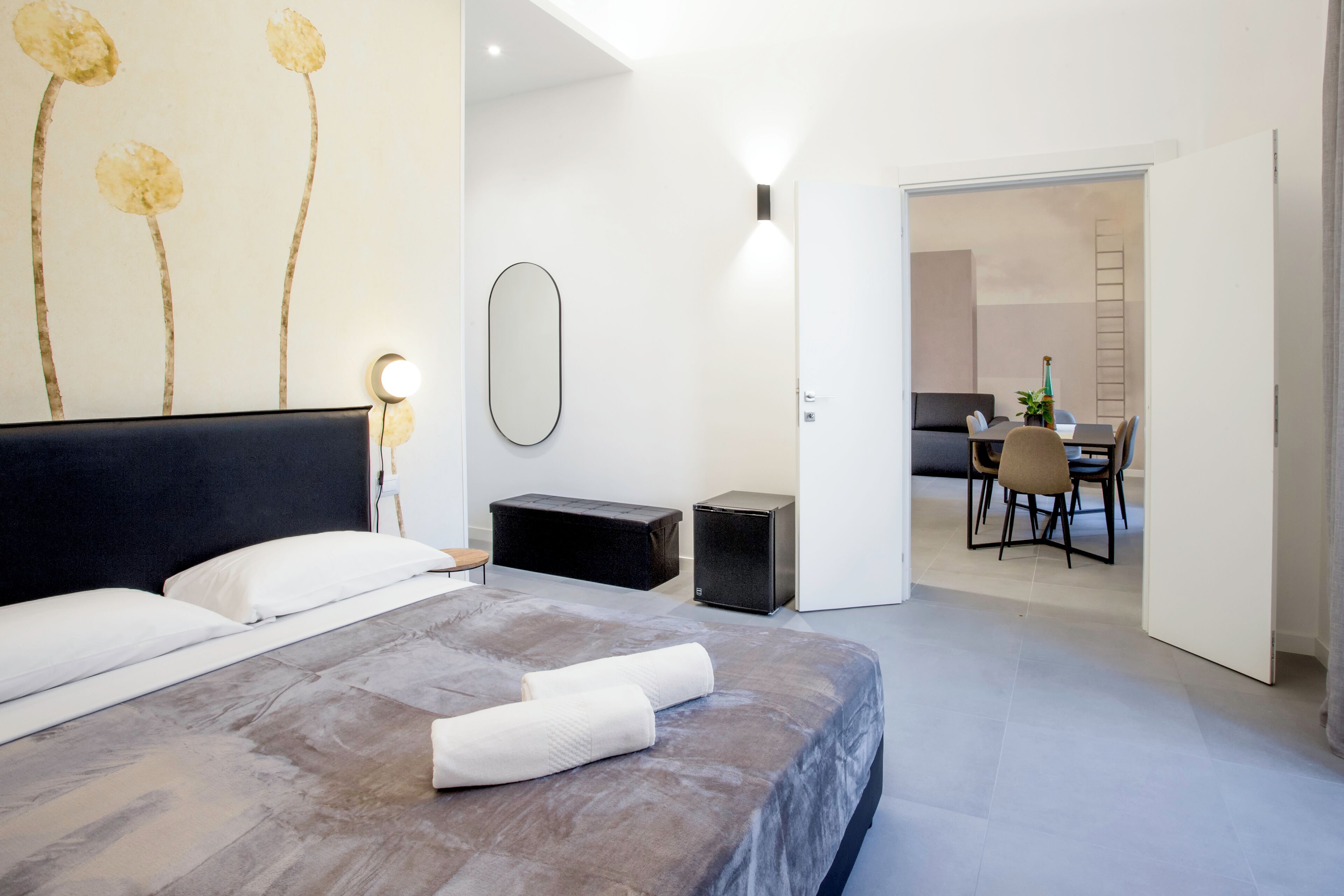 Deluxe Studio Suite | Down comforters, in-room safe, desk, iron/ironing board