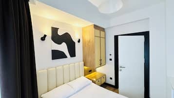 Deluxe Apartment, Courtyard View | 2 bedrooms, premium bedding, soundproofing, iron/ironing board