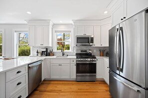 Fridge, microwave, oven, stovetop - Charming waterfront, 3-bedroom house on Goose Creek in welcoming Southold (Southold)