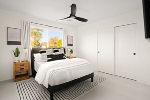3 habitaciones, escritorio y tabla de planchar con plancha