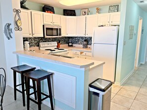 Condo, Multiple Beds, Balcony, Ocean View (The Dunes W501) | Private kitchen | Coffee/tea maker, dining tables