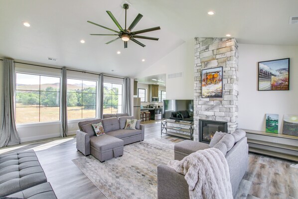 TV, fireplace, books