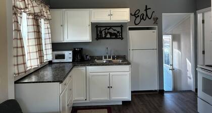 This cozy house has been completely remodeled inside and features three bedrooms.