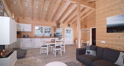Log cabin by the lake with sauna and fireplace in the middle of the Harz mountains and forests