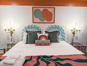 1 bedroom, desk, iron/ironing board, travel crib