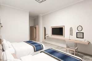 A hotel room with two beds, a TV, a desk, and a mirror. - Ewenki Qixin Dun Hotel (Ewenki Autonomous Banner)