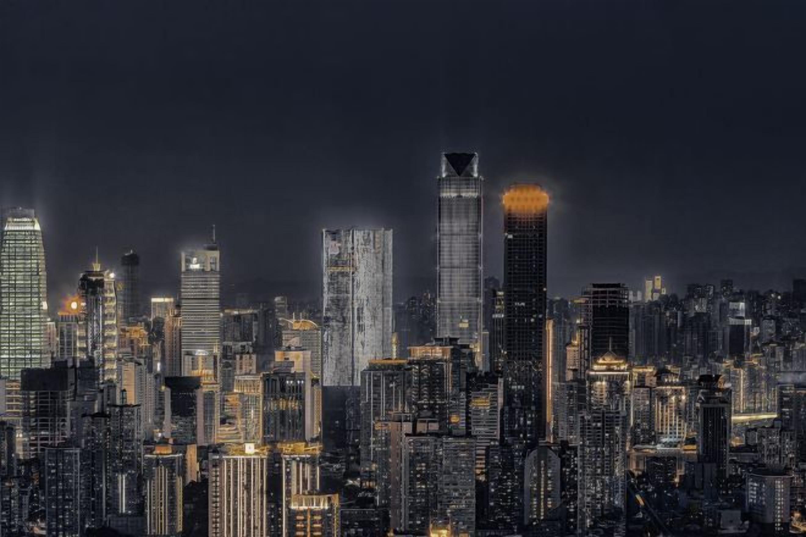A nighttime cityscape with illuminated skyscrapers.