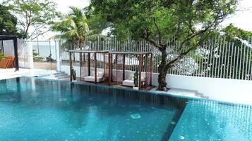 Outdoor pool, pool umbrellas, sun loungers