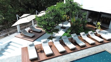 Outdoor pool, pool umbrellas, pool loungers