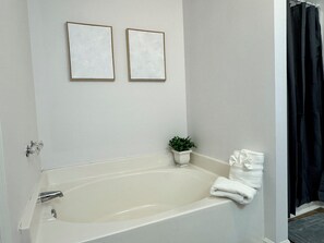 Hair dryer, towels, soap, shampoo - Bright Spacious Renovated Home. Master on Main Floor.  (Winder)