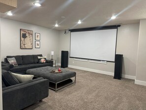 Smart TV, fireplace, DVD player, books