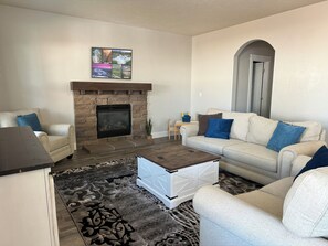Smart TV, fireplace, DVD player, books