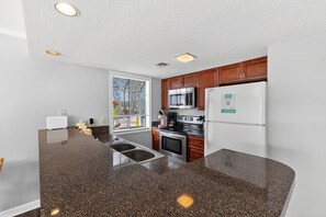 Fridge, microwave, dishwasher, coffee/tea maker