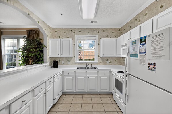 Fridge, microwave, dishwasher, coffee/tea maker